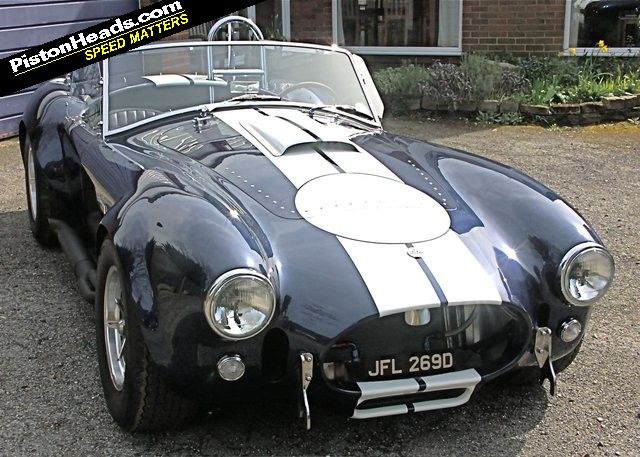  AC Cobra a vehicle which carries the image of a serpent on its badge