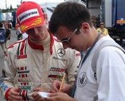2005's winner Mike Channell interviews Heikki Kovalainen at Monza 2005